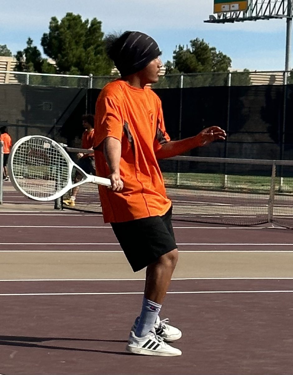 Senior David Hernandez takes his volleyball skills to the tennis court.